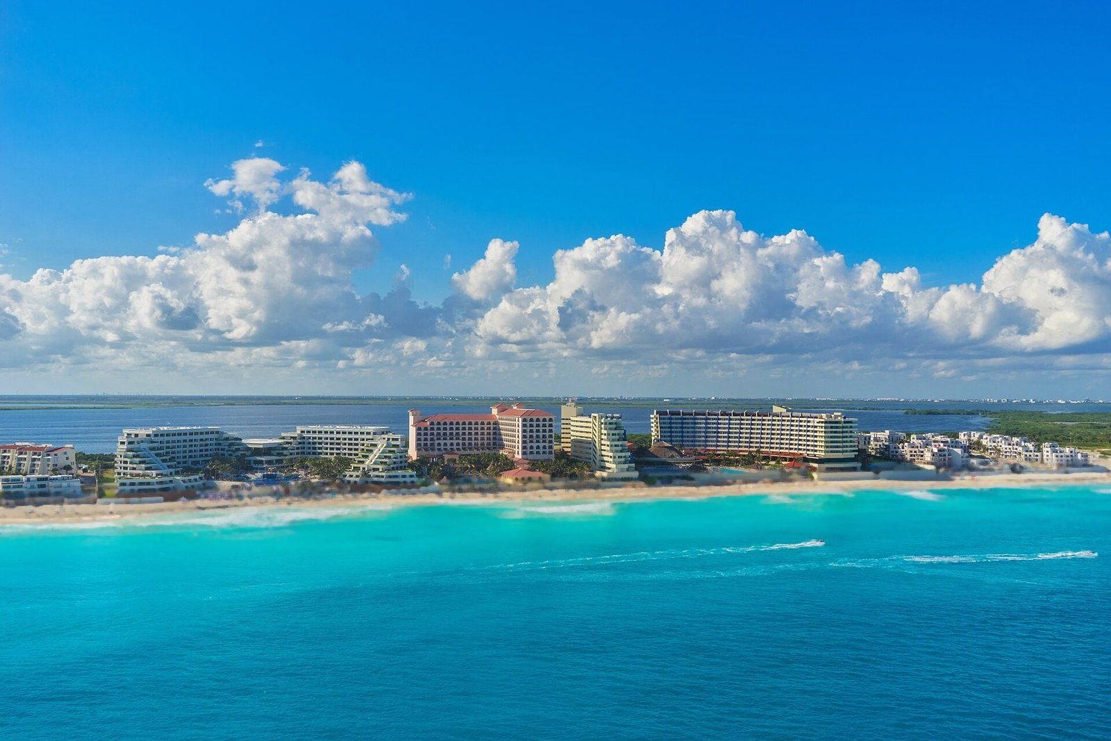Cancún Hotel Zone and its long white beach from the air